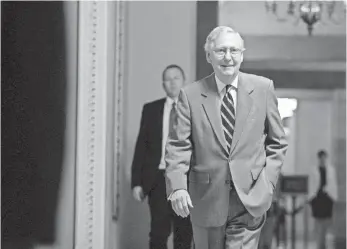  ?? ANDREW HARNIK, AP ?? Senate Majority Leader Mitch McConnell still plans to hold a vote next week on some form of legislatio­n that would repeal Obamacare despite the absence of Sen. John McCain.