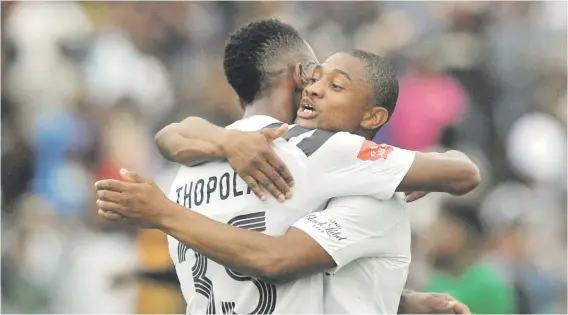  ?? Picture:Backpagepi­x ?? WINNER. Orlando Pirates’ Thabo Qalinge celebrates after scoring his goal with Diamond Thopola during their Absa Premiershi­p match against AmaZulu at the King Zwelithini Stadium yesterday.