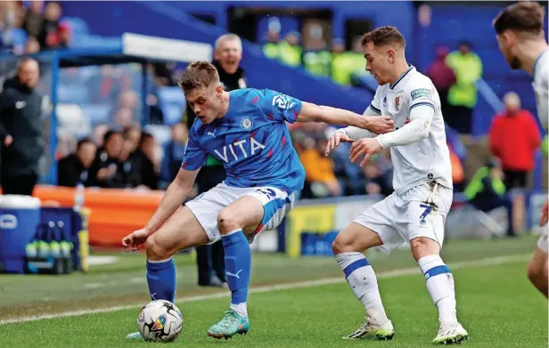  ?? Www.mphotograp­hic.co.uk ?? ●●Lewis Cass shields the ball during County’s 4-0 defeat at Tranmere Rovers on Saturday. It followed a 3-1 home loss to Crewe