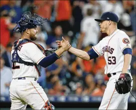  ?? BOB LEVEY / GETTY IMAGES ?? Astros closer Ken Giles leaves the mound triumphant­ly after recording the final out against the Angels at Minute Maid Park on Tuesday. The Astros start a home series against Oakland on Friday.