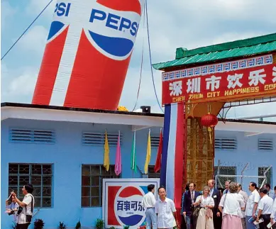  ?? CFB ?? In 1982, the Shenzhen-based Happiness Soft Drink Factory, the first China- U. S. cooperativ­e enterprise in China to produce Pepsi, was put into operation. China’s business environmen­t has witnessed consistent improvemen­t over the past four decades.