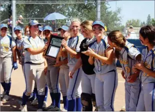  ?? Mike Bush/ For the Appeal file photo ?? Sutter High’s softball team is awarded a second of three straight championsh­ips after defeating Lassen 13-2 in the Northern Section Division IV title game in May, 2018.