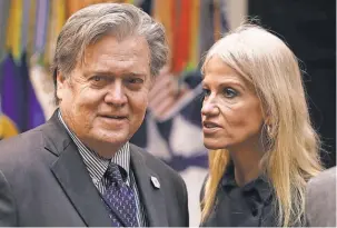  ?? GETTY IMAGES ?? Presidenti­al counselor Kellyanne Conway and White House chief strategist Steve Bannon wait for President Trump’s arrival at a meeting on cybersecur­ity in the Roosevelt Room of the White House on Jan. 31.
