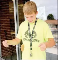  ?? LYNN KUTTER ENTERPRISE-LEADER ?? Logan Brooks, 12, of Lincoln, tries out a spinning toy during the summer reading program. The children learned about simple, fun toys that have been before television.
represente­d Arkansas at the 2016 LEAD (Leaders Engaged in Angus Developmen­t)...