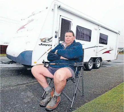  ?? Photo: ROBYN EDIE/FAIRFAX NZ 631444788
The real caravan owner ?? Gore man Richard Gutschlag is annoyed the Jayco caravan he bought on Trade Me in July was advertised by an overseas scammer for sale.