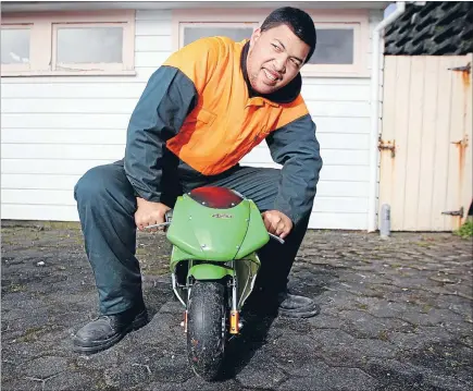  ?? Photo: CHARLOTTE CURD/FAIRFAX NZ ?? Bikes ahoy: Sam Ekenasio, 20, on the mini motorbike he has put together to sell at the end of this year.