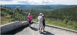  ?? DARREN CALABRESE / THE CANADIAN PRESS ?? Tourists at Gros Morne National Park, N.L. The park reported more incidents of illegal hunting and poaching than any other national park in the country.