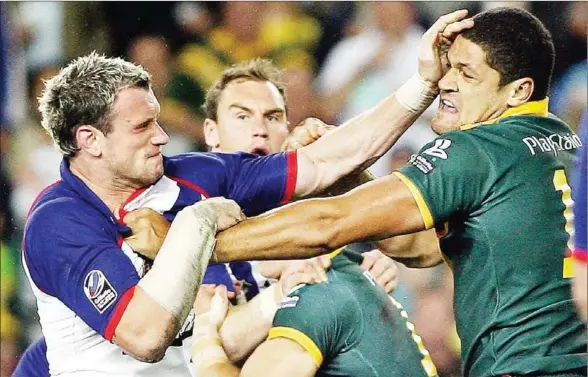  ?? AFP ?? Great Britain and Australia’s clash in 2006. The fixture is the foundation­stone of the internatio­nal rugby legaue, but it is likely to be missed amid the Covid-19 pandemic.