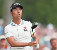  ?? ASSOCIATED PRESS ?? Kevin Na watches his shot from the third tee during his round of 69 in the Colonial.