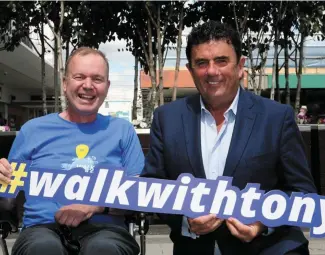  ??  ?? Raising awareness and funds: Fr Tony Coote, left, of Walk While You Can (wwyc.ie), with RTÉ’s Des Cahill. Below: Kate Winslet stars in Wonder Wheel