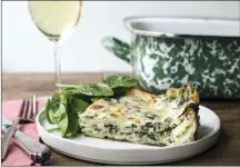  ?? The Associated Press ?? White and green spinach lasagna from a recipe by Katie Workman.