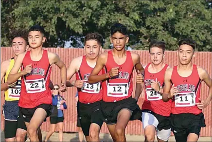  ?? PROVIDED PHOTOS ?? McFarland boys cross country runners compete at a meet this season.