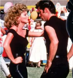  ?? ?? Lead couple: Olivia Newton-John and John Travolta in film. Right: Olivia Moore and Dan Partridge on stage