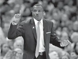  ?? AP Photo/Tony Dejak ?? ■ Toronto Raptors head coach Dwane Casey gestures against the Cleveland Cavaliers in the first half of Game 4 of a second-round playoff series Monday in Cleveland.