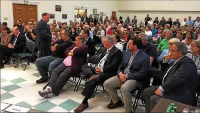  ?? LESLIE KROWCHENKO — DIGITAL FIRST MEDIA ?? Delaware County Councilman Dave White talks to the crowd at Springfiel­d’s Monday night town hall meeting on the heroin epidemic.