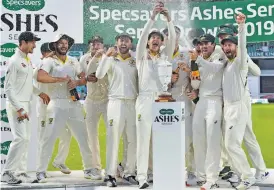  ?? — AFP ?? Australia celebrate after retaining the Ashes. The series ended 2-2 on Sunday.
