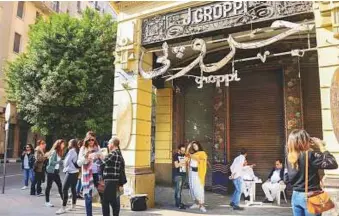  ??  ?? Above: The facade of the historic ice cream shop Groppi in central Cairo.