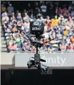  ?? NAM Y. HUH/ THE ASSOCIATED PRESS ?? The original SkyCam can fly from 12 feet to 40 feet above the playing field, while the high SkyCam goes from 40 to 80 feet.