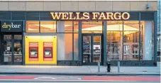  ?? /Reuters ?? Work from home: The Wells Fargo Bank branch in New York. The bank says its policies are precaution­ary and meant to keep employees safe without compromisi­ng the quality of service.