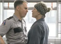  ?? FOX SEARCHLIGH­T ?? Both Sam Rockwell, left, as a inept police officer and Frances McDormand as a grieving mother could be looking at Oscar nomination­s for their performanc­es in “Three Billboards Outside Ebbing, Missouri.”