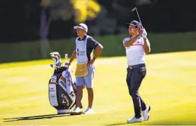  ?? CHASE STEVENS AP ?? Xander Schauffele hits a fair way shot at the 18th hole of Shadow Creek during the second round of the CJ Cup in North Las Vegas. Schauffele shot a course-record 64.