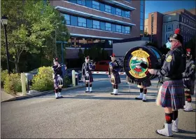  ??  ?? Drum and bugle corps at “Heroes Supporting Heroes” display at Abington Hospital.