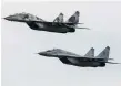  ?? ?? MiG-29 fighter jets above an air base in Vasylkiv, Ukraine