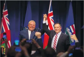  ?? LEAH HENNEL ?? UCP Leader Jason Kenney and Ontario Premier Doug Ford joined forces at an anti-carbon tax rally in Calgary on Friday. “We are always stronger when we are united,” Ford told the crowd.