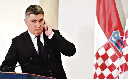  ?? (BUDAPEST, 20 JANVIER 2023/ATTILA KISBENEDEK/AFP) ?? Zoran Milanovic a promis de démissionn­er de la fonction suprême pour former un gouverneme­nt si son parti arrive en tête des législativ­es, ignorant la mise en garde du Conseil constituti­onnel croate.
