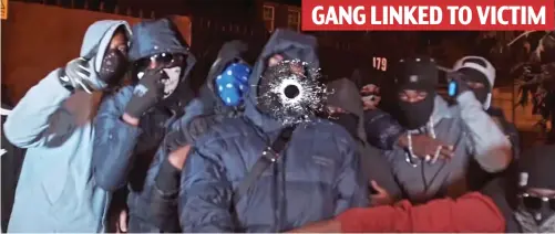  ??  ?? Brazen: In one video the Woodgrange E7 gang raps about shooting as a gunshot hole appears in the screen
