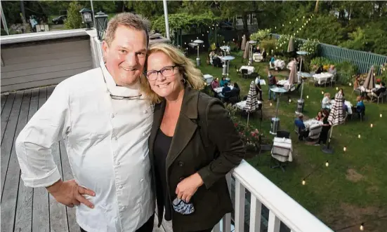  ?? Bryan Haeffele/Hearst Connecticu­t Media ?? Bernard and Sarah Bouissou, owners of Bernard's Restaurant and Sarah's Wine Bar in Ridgefield, decided to sell the restaurant after 21 years in 2021.