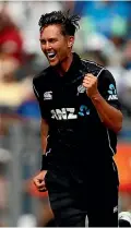  ?? REUTERS ?? Trent Boult celebrates the wicket of India’s Rohit Sharma in the opening game.