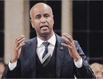  ?? ADRIAN WYLD THE CANADIAN PRESS ?? Minister of Immigratio­n, Refugees and Citizenshi­p Ahmed Hussen rises during question period in the House of Commons on Parliament Hill in Ottawa last month. Canada's current and possible future use of artificial intelligen­ce to help screen and process immigrant visa applicatio­ns could lead to discrimina­tion.