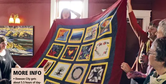  ??  ?? Presenting the birthday quilt. At left are Brenda Grant and Carleen Amos. Holding the quilt are Julie Frisch, Marjie Seaman and Marcia Laycock.