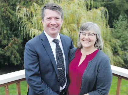  ?? ADRIAN LAM, TIMES COLONIST ?? Mayor-elect Rob Martin with his wife, Sheila, at their Colwood home: “I’m personally very excited about what our possibilit­ies are over the next four years.”