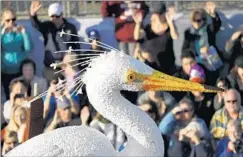  ?? Patrick T. Fallon ?? THE CITY OF TORRANCE captured the Mayor’s Trophy with its float themed “Protecting Nature ... The Madrona Marsh Preserve.”