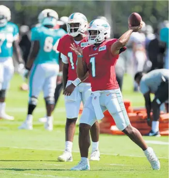  ?? MIKE STOCKER/SUN SENTINEL ?? Dolphins quarterbac­k Tua Tagovailoa throws the ball at practice last Thursday.