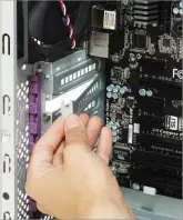  ??  ?? Remove the blanking plate at the back of your PC’S case to make room for the card’s ports Position your graphics card over the slot on the motherboar­d and carefully push it in