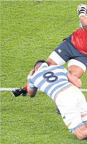  ??  ?? England’s Billy Vunipola is tackled by Argentina’s Javier Ortega Desio at the World Cup in Japan.