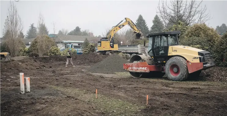  ?? — CP FILES ?? Work begins on temporary housing last month in Vancouver: The city has pledged 72,000 new homes for renters, families and the vulnerable over the next 10 years.