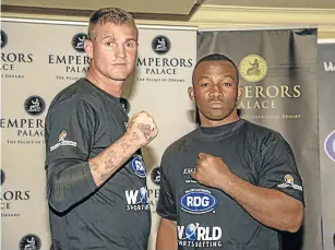  ??  ?? FISTS LOOK THREATENIN­G: Thomas ‘Tommy Gun’ Oosthuizen faces off with Thabiso ‘The Rock’ Mchunu. The boxers are scheduled to exchange leather in a Golden Gloves tournament on Saturday.