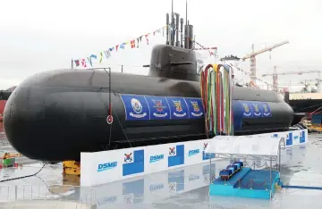  ??  ?? The 3,000-tonne diesel-electric submarine is seen during a launching ceremony at a shipyard on the southern island of Geoje. — AFP photo