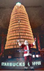  ??  ?? A massive Christmas tree made with red cups