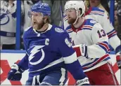  ?? CHRIS O'MEARA — THE ASSOCIATED PRESS ?? Lightning center Steven Stamkos, left, is elated after scoring against the Rangers in Game 6Saturday night.