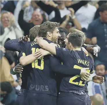  ?? PICTURE: GETTY IMAGES ?? 2 Celebratio­n time for Tottenham after taking a 28th-minute lead at the Bernabeu.