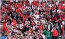  ??  ?? Turkish football fans in Paris respond to the players with their own military salutes. Photograph: Aurélien Meunier/Getty Images