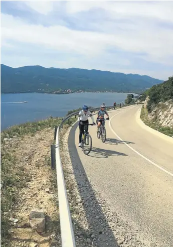  ??  ?? SLOW AND STEADY Cyclists tackle the 31km hill at Bol on the island of Brac.