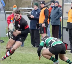  ??  ?? Enniscorth­y’s Richard Dunne making a break against Clonmel.