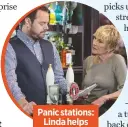  ??  ?? Panic stations: Linda helps
Mick