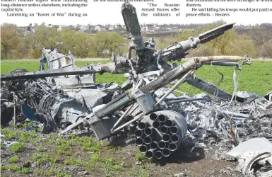  ?? AFPPIX ?? The wreckage of a downed Russian helicopter lying in a field near Kharkiv on Saturday. –